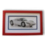 White car in red frame