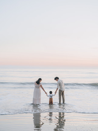 Candid beach family photography at sunset near Hendry's Beach in Santa Barbara California