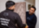 Movers carrying furniture