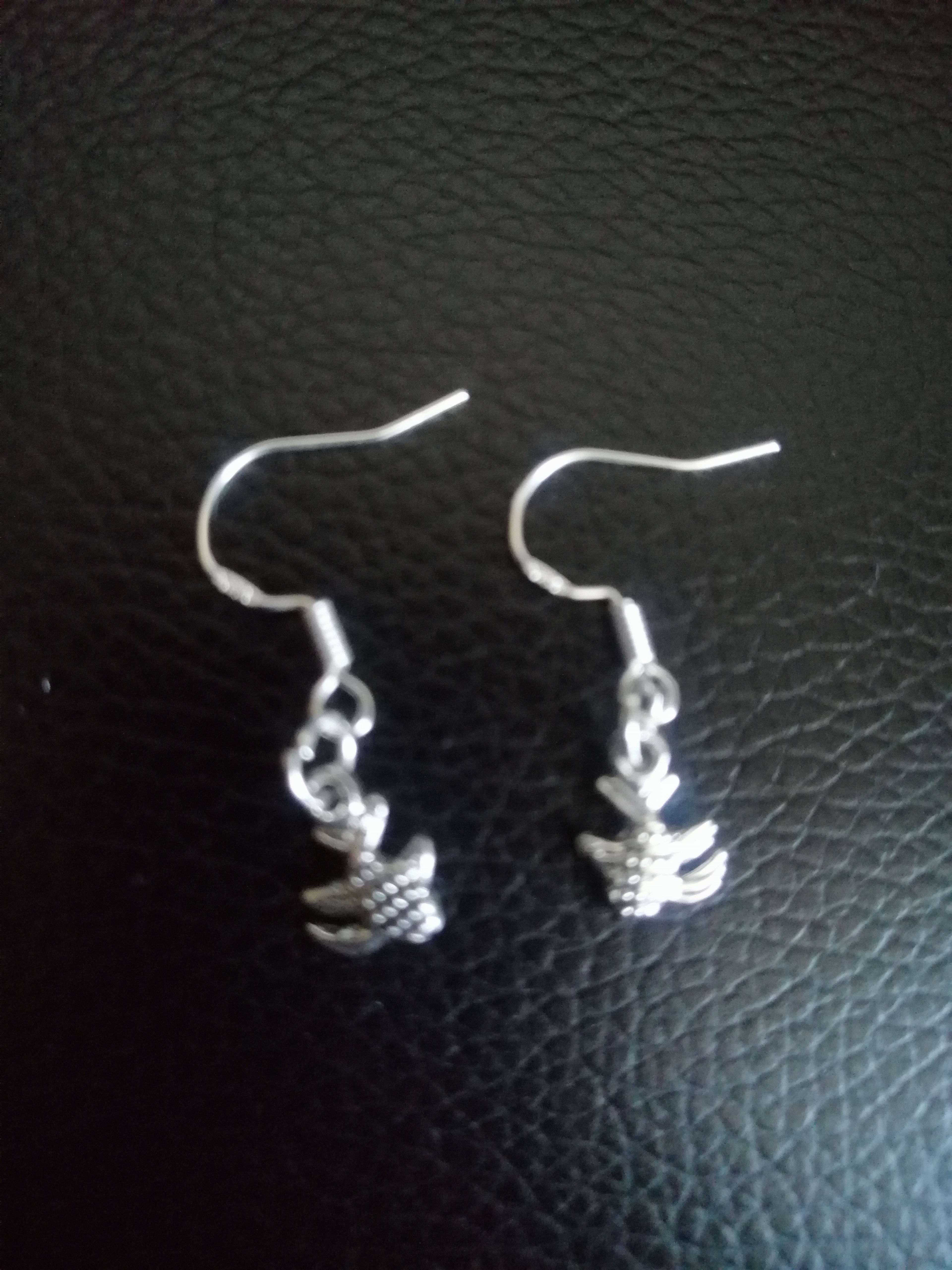 Pair of silver fish earrings