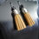Thumbnail: Pair of silver earrings handmade vegan leather with golden fringes