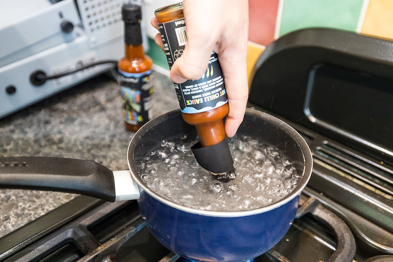 Using boiling water to shrink a Heat shrink capsule