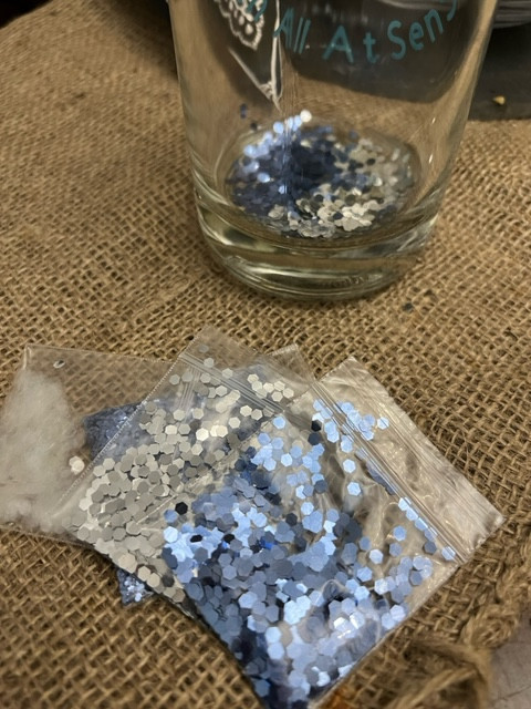 snow globe from glass bottle