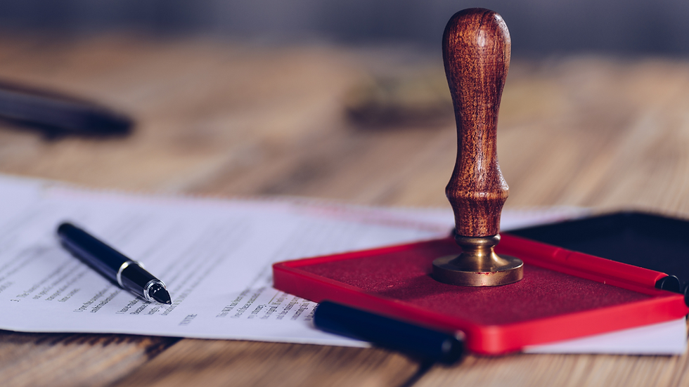 Eye-level view of a notary public's tools on a table