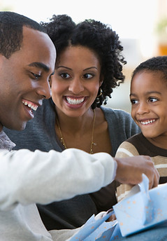 A family sitting together to illustrate a family gathering