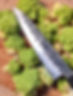 Image of Forge To Table knife over chopped up broccoli