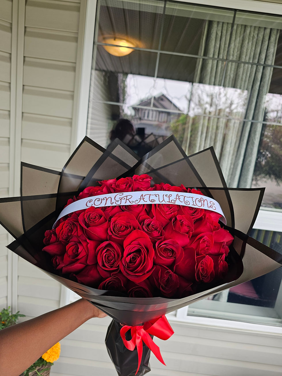 Thumbnail: Classic Red Bouquet wrapped in black