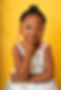 canva-smiling-black-girl-in-glasses-touching-chin-and-looking-at-camera-MAEJWpWr-nM.jpg