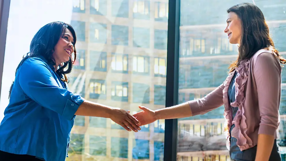 Reliable Customer Support Photo. Closing deal with a cusotmer infront of window.webp