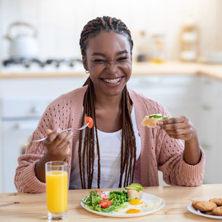 beautiful black woman eating healthy