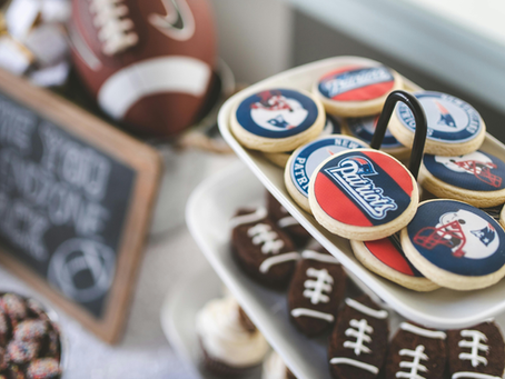 Plate with American football themed cookies.