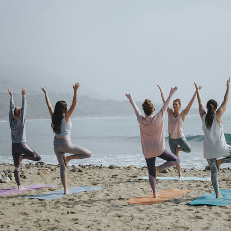 yoga class on the beach