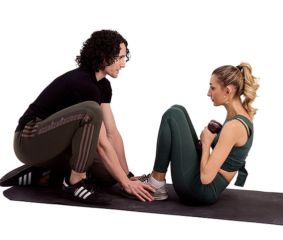 One-on-one personal training session with NYC fitness coach helping client build strength