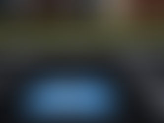 Freshly painted ADA-compliant handicap parking space with sign in Portland, Oregon