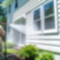 pressure washing a house.jpg