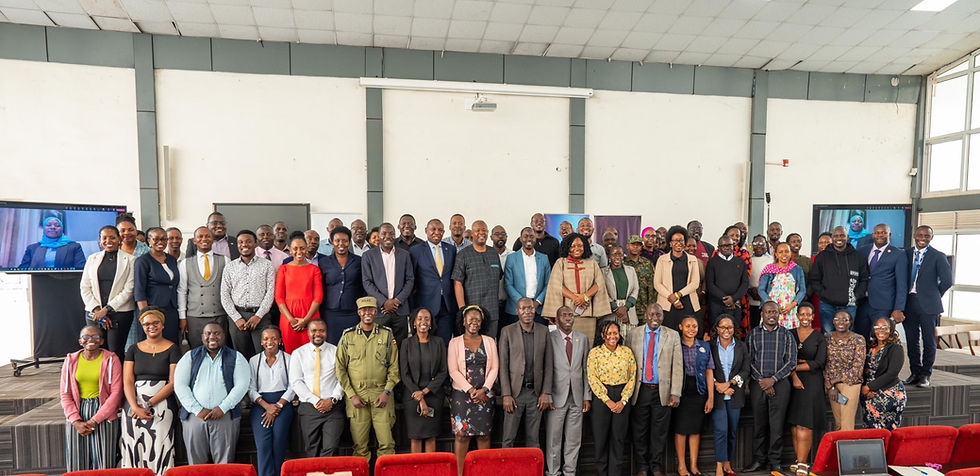 Over 200 Government Communications Officers pose with trainers at the launch of a week-long strategic media training at the National ICT Innovation Hub in Nakawa.
