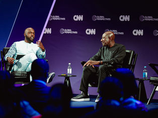 MTN Group Vice President Ebenezer Asante (right) with CNN Reporter Larry Madowo