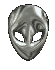 a spinning gif of a super cool metal alien head