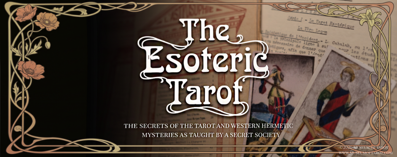 Tarot cards on a table with a crystal ball.