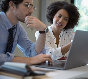 Colleagues Working in Office