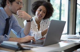 Colleagues Working in Office