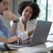 Colleagues Working in Office