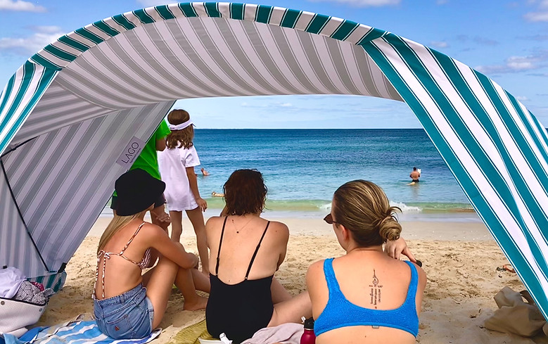 Sitting under a Lago beach tent.jpg