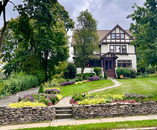 house with garden in front yard