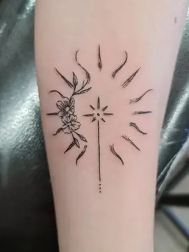 artistic fine line sun tattoo delicate small flowers and sun stars
