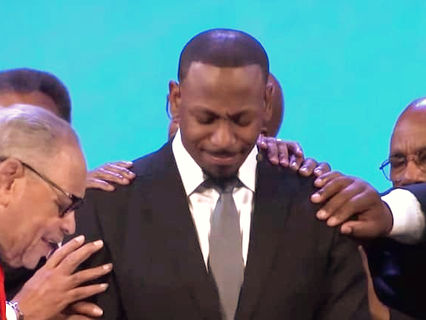 The Transition is Complete: Jonathan Evans is installed as the new Senior Pastor of Oak Cliff Bible Fellowship as his father, Tony Evans, looks on