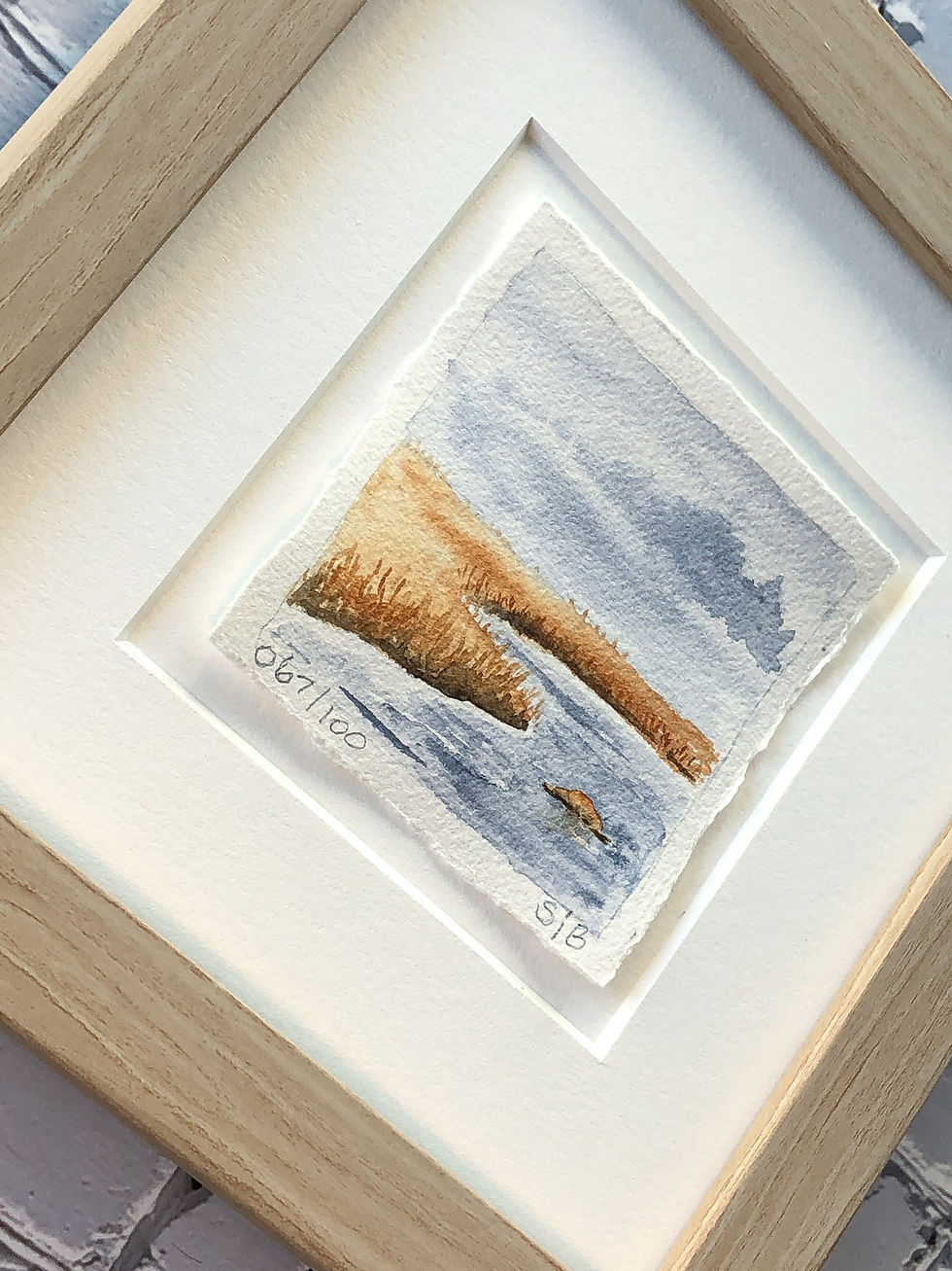 Thumbnail: watercolor painting of water surrounded by golden grasses framed mat details