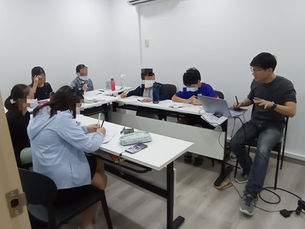 Teacher Ko conducting P6 Science Booster