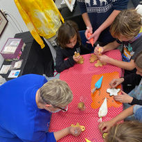 people decorating cookies