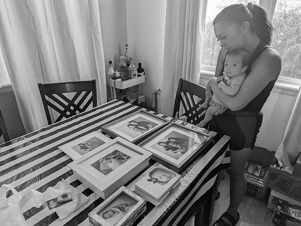 Newborn session preparation with curated props and styling materials at Tiny Details Photography studio