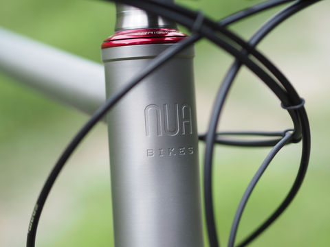 Nua Silice titanium gravel bike frame with sandblasted finish