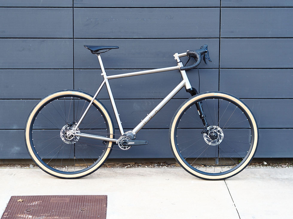 titanium gravel bicycle with pinion smart shift gearbox and drop bars