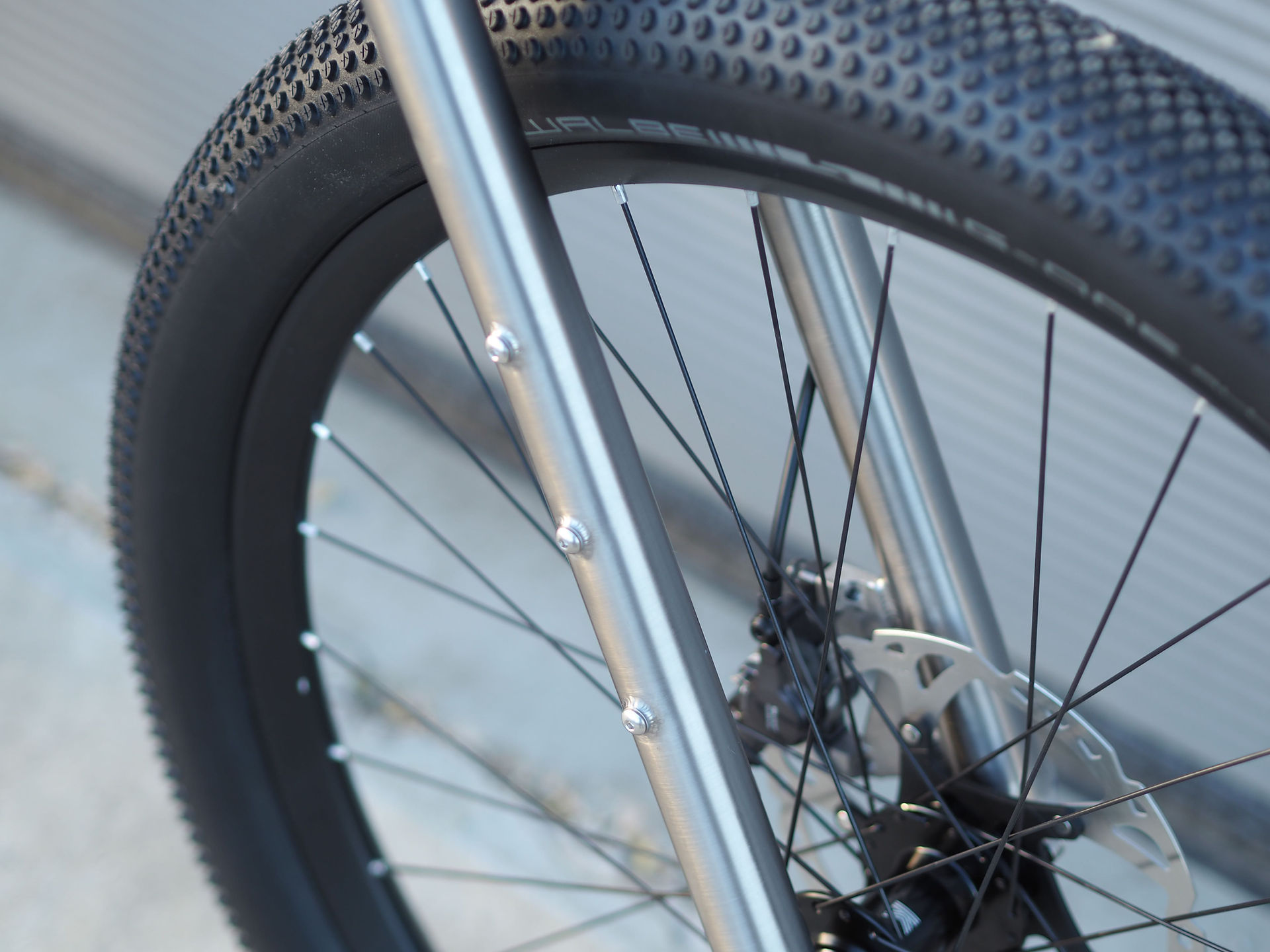 3-pack mounts on the Nua titanium Type B fork for bikepacking