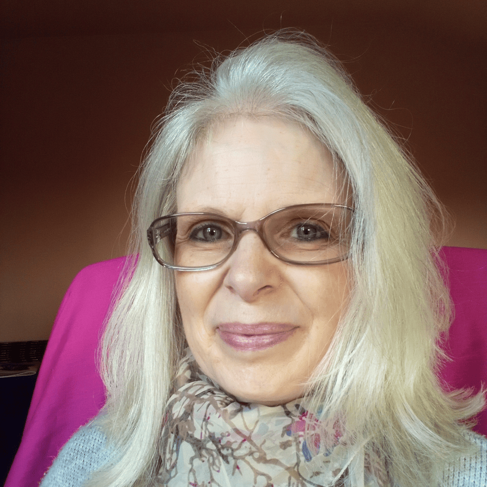 A headshot photograph of Sharon