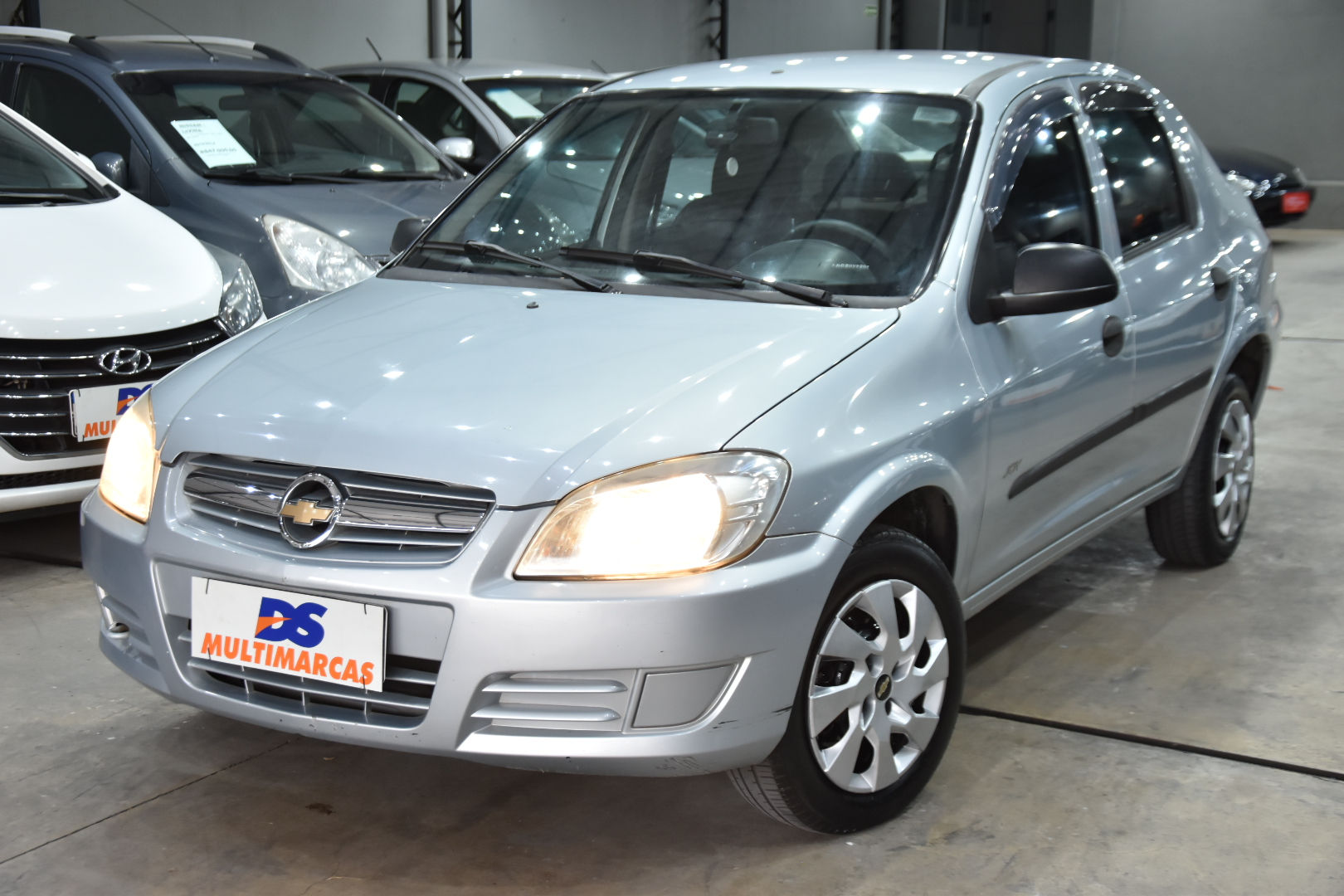 CHEVROLET  -  PRISMA 1.0 MPFI VHCE JOY 8V FLEX 4P MANUAL Cor Prata     2010/2010