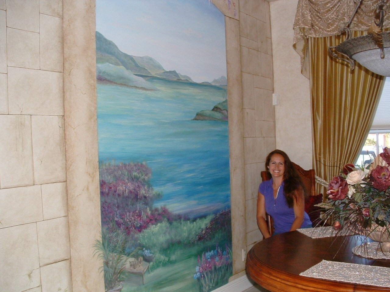 me with mural.JPG
