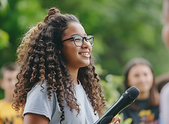 girl-with-glasses-microphone-her-hand.jpg