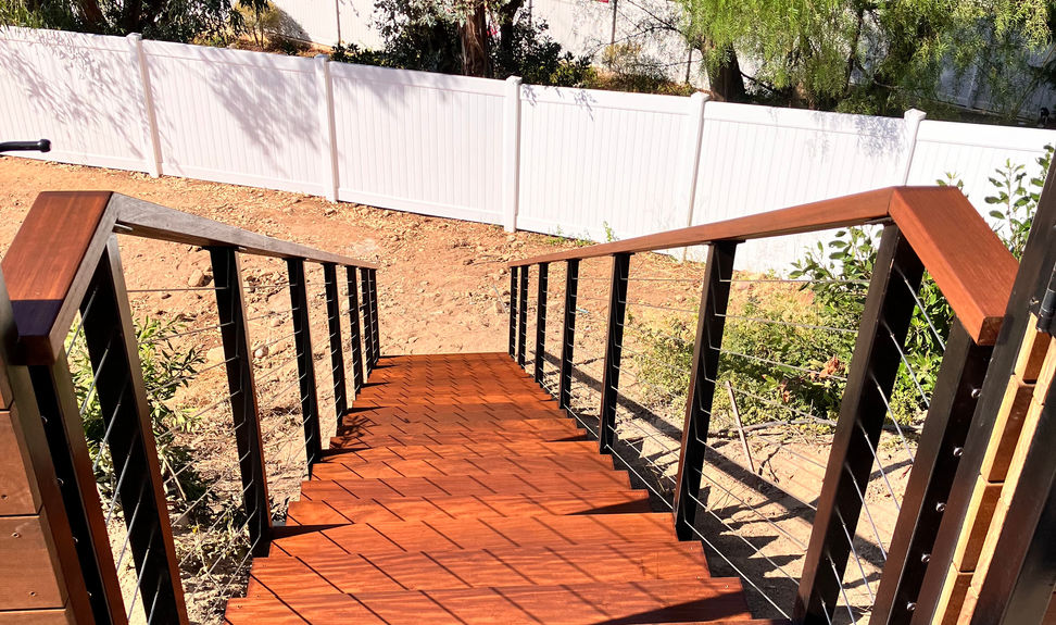 Custom Ipe stairs with steel frame installed in Anaheim Hills by Amazing Custom Fence | Request a Quote.