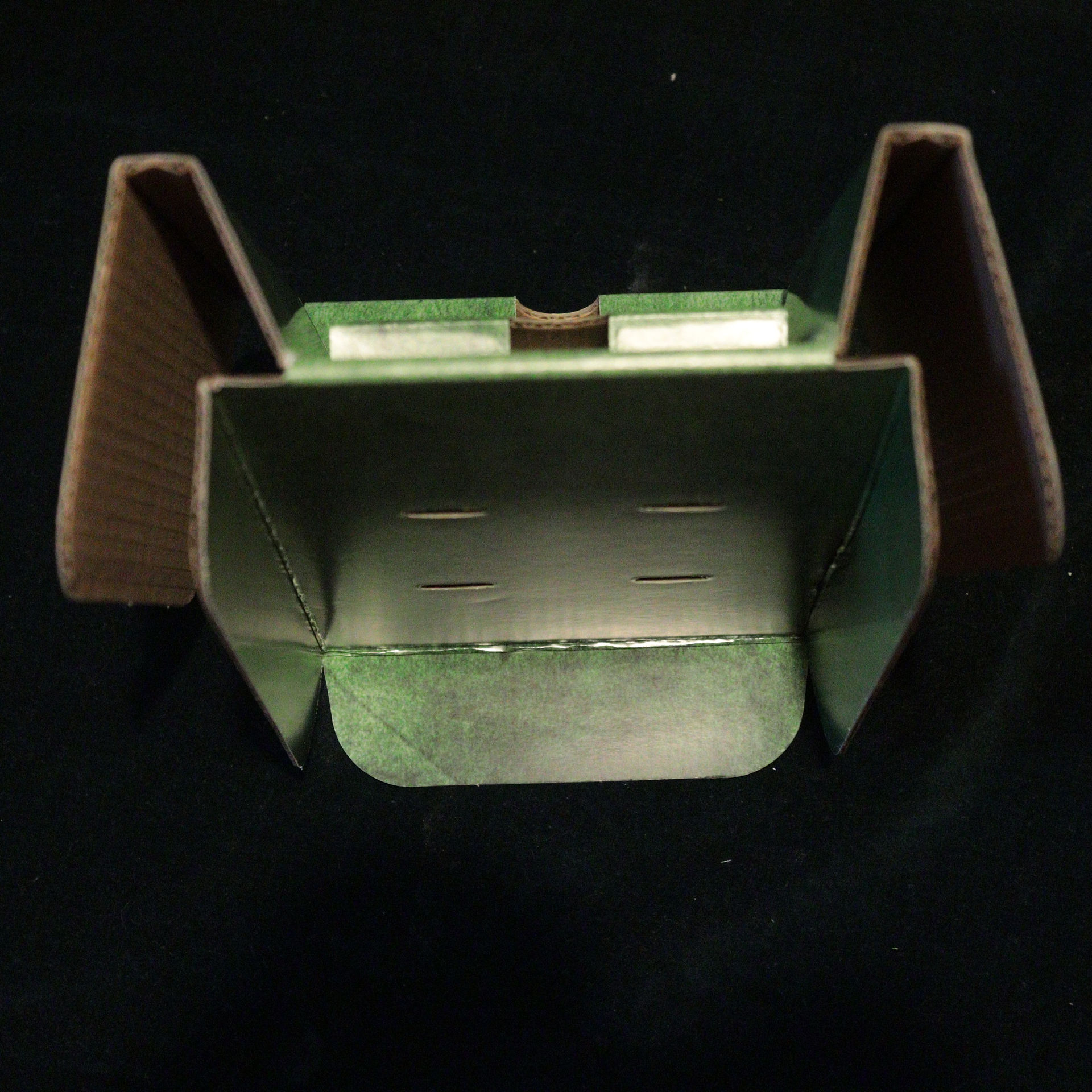 A closeup of an end view of the cardboard insert from Psychobabble for illustrating wasted card/sapce