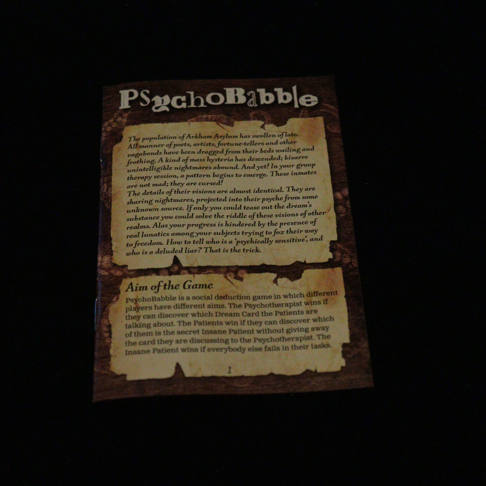 Closeup of the front page of the rulebook from Psychobabble