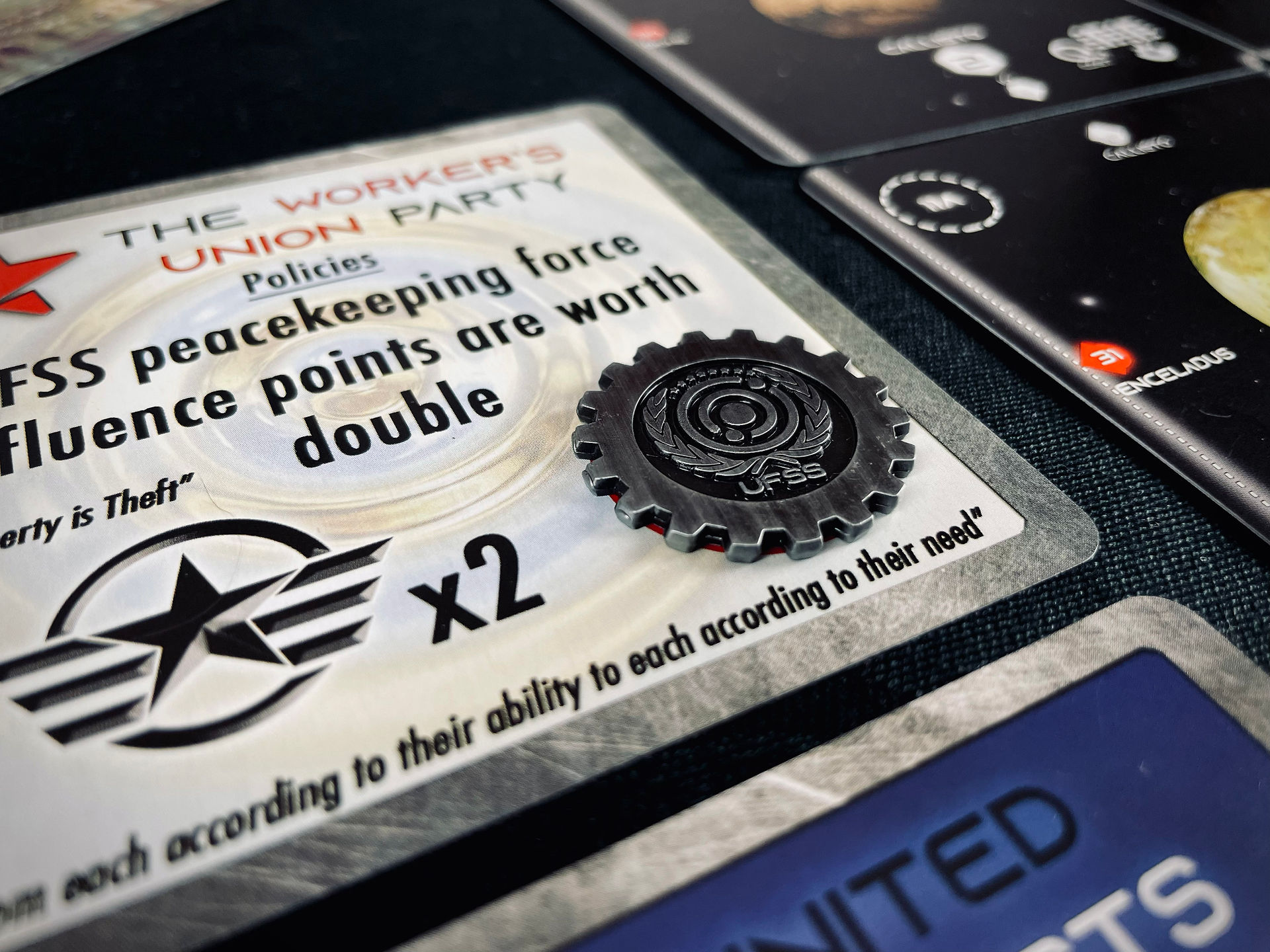 Close up of The Worker's Union Party political card with the current government marker on it.
