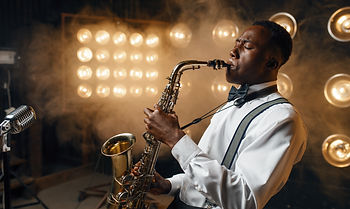 black-jazz-performer-plays-the-saxophone-on-stage-2022-02-08-22-39-25-utc.jpg
