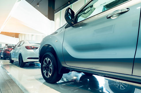 new-car-parked-in-modern-showroom-auto-leasing-an-2025-01-29-04-41-48-utc.jpg