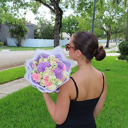 Pastel pink, purple, and white mixed flower bouquet