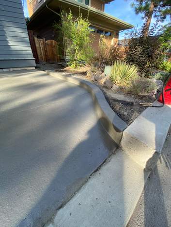 Concrete driveway with curb