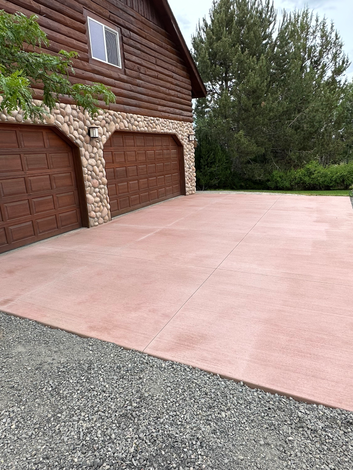 Colored, broom finish concrete driveway 